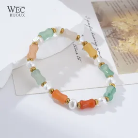 ELASTISCHES ARMBAND AUS EDELSTAHL, STEIN UND PERLE